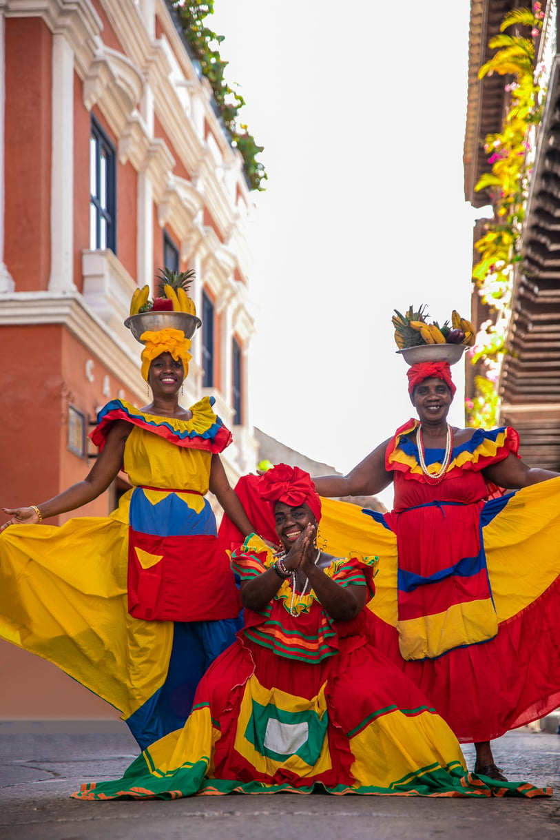 Women in Colorful Dress in the Street 